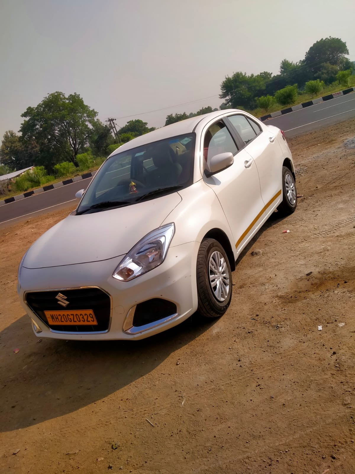 Sambhajinagar Cabs sedan by the waterfront
